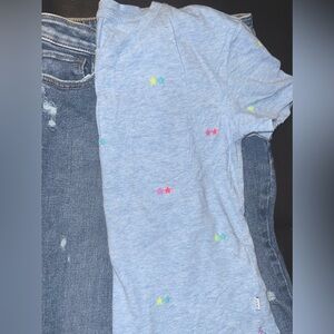 High-Rise Skinny Ankle Jeggings and blue cotton T with embroidered stars.